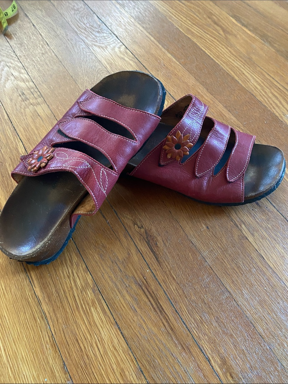 Think adjustable leather sandal.